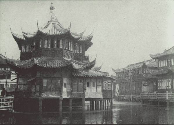 WILLOW PATTERN TEA HOUSE IN SHANGHAI  A famous landmark in the native city; said to be one of the oldest tea-houses in China. Much business is transacted in these tea-houses all over the country.