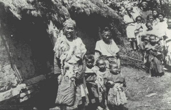 FAREWELL TO THE TRAVELER  These people had never seen a white man, their faces show that, at farewell after a very pleasant stay among them, they were not altogether broken-hearted to see the author go!