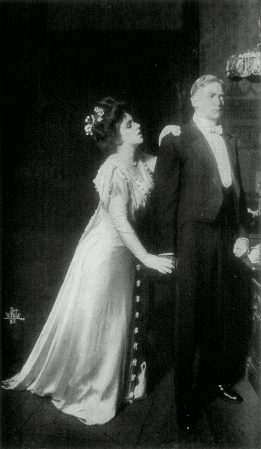 [Photo, from the play, of Shirley appealing to Mr. Ryder]