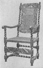 This reproduction of a Charles II chair shows cherubs supporting crowns.