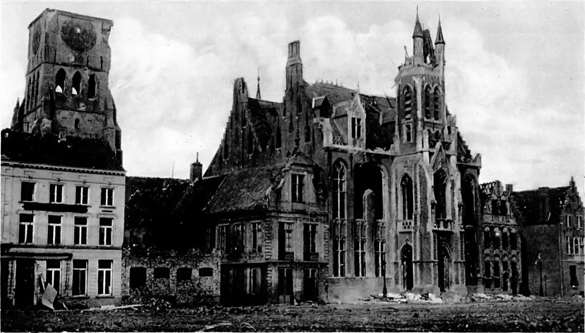 THE LITTLE BELGIAN TOWN TAKEN BY THE GERMANS AFTER THREE WEEKS: DIXMUDE--THE HOTEL DE VILLE AND CHURCH TOWER.