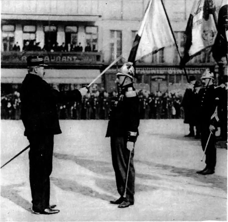 FOR GALLANTRY ON THE FIELD OF HONOUR: A FRENCH OFFICER RECEIVES THE ACCOLADE.