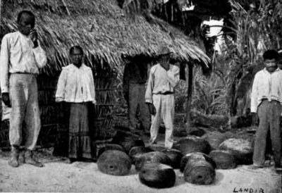 Balls of Rubber outside a Seringueiro's Hut.