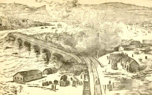 THE WRECKED HOUSES BURNING AT THE PENNSYLVANIA RAILROAD BRIDGE.