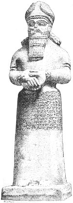 Fig. 15.—Statue of Nebo; from Nimroud. British Museum. Calcareous stone. Height 6 feet 5 inches.