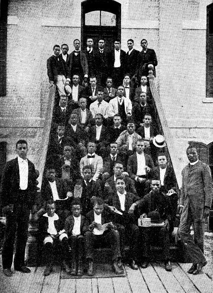 GROUP OF STUDENTS ON STEPS OF ALLEN HALL, TILLOTSON COLLEGE.