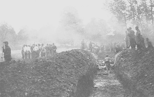 THE COMMON GRAVE OF NINE HUNDRED DEAD NEAR SOIZY-AUX-BOIS