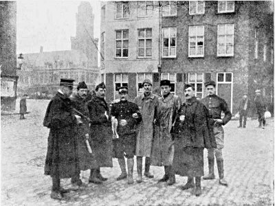 WITH A GROUP OF BELGIAN OFFICERS AT FURNES, BELGIUM, 1914. ONE OF THEM USED TO ACT AS MY COURIER