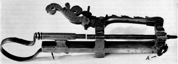 Figure 3.— Small thread-cutting lathe which was made to be held in a vise during use. It was found as shown here, with only the operating crank missing. The overall length is approximately 12 inches, depending on the adjustment of parts. (Smithsonian photo 46525B.)