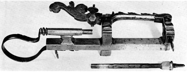 Figure 5.—Spring for keeping the follower spindle against the work, showing the method and range of adjustment. Note the rectangular projection to engage a mating socket in the spindle, to prevent spindle rotation. (Smithsonian photo 46525.)