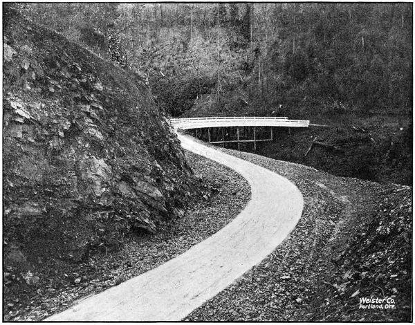 ON THE PACIFIC HIGHWAY SOUTH OF WOLF CREEK IN JOSEPHINE COUNTY. CONSTRUCTED IN 1917 AND 1918