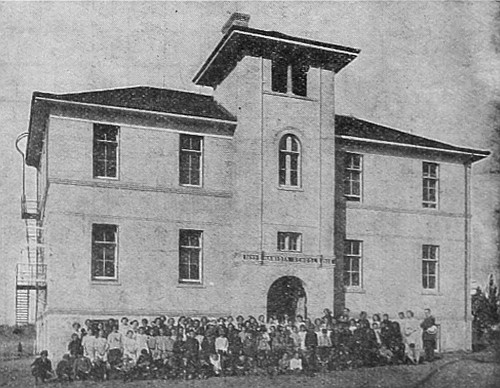 Typical school, such as many towns are building in Western Canada, where the education of the children is carefully looked after.