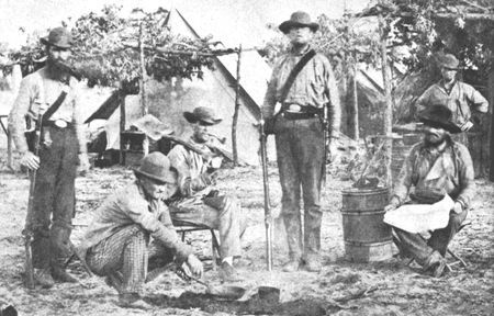 Ill-clad and poorly equipped, Confederate volunteers at Pensacola, Florida, wait their turn for the smell of black powder.