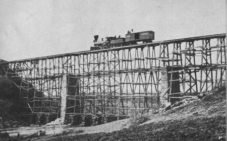 This "cornstalk" bridge over Potomac Creek near Fredericksburg was built by the Military Railroad construction corps from 204,000 feet of standing timber in nine days.