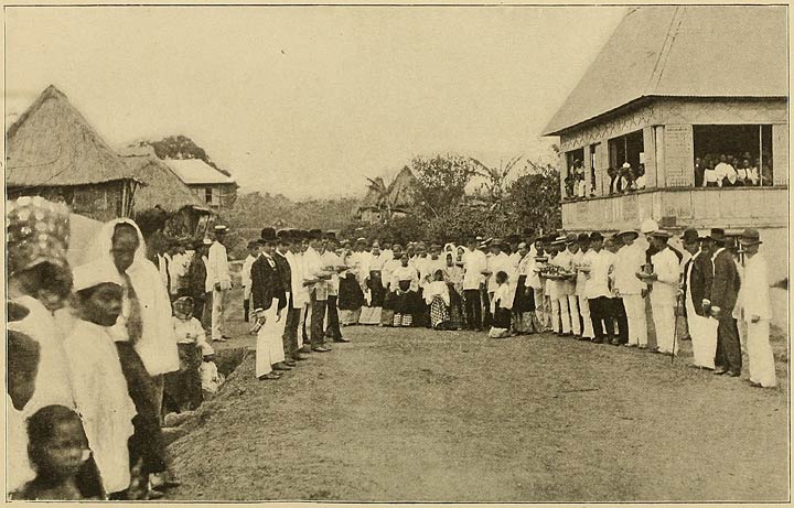 A Procession of Natives Carrying Fish.