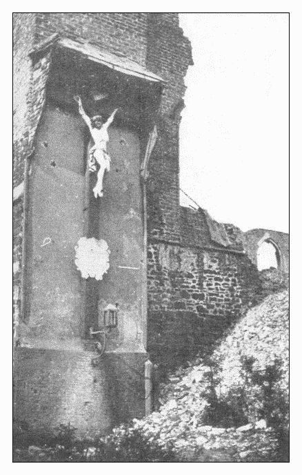 The crucifix on the shattered church