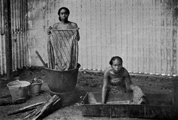 Women dyeing sarong-cloth.