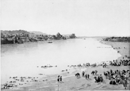 MOSUL.  View from the bridge, looking up stream. The Tomb of Cassim is one of the more distant buildings near the water-side.