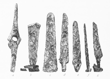 No. 45. Copper Implements and Weapons from the Trojan stratum (8 M.). a, Axe of an unusual form; b, c, Battle-Axes of the common form; d, e, g, Knives; f, a Nail.