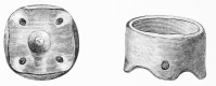 No. 144. Small Terra-cotta Vessel from the lowest Stratum, with four perforated feet, and one foot in the middle (14 M.).