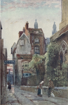 OLD HOUSES NEAR ST. EDWARD’S CHURCH AND ST. EDWARD’S PASSAGE  This Passage leads from the Market into King’s Parade. Part of the South side of St. Edward’s Church is seen on the right. The Reformers Bilney, Barnes, and Latimer preached here. The three Tuns Inn, praised by Pepys for its good liquor, formerly stood in this passage.