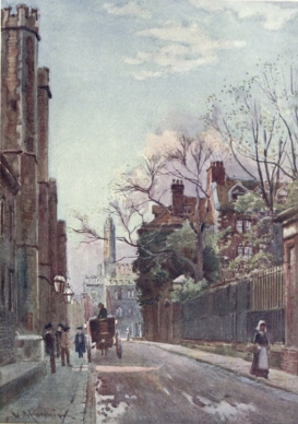 QUEENS’ LANE—THE SITE OF THE OLD MILL STREET  The Towers of Queens’ College Gateway are seen on the left, through the trees on the right is St. Catherine’s College, and in the distance a portion of King’s College.