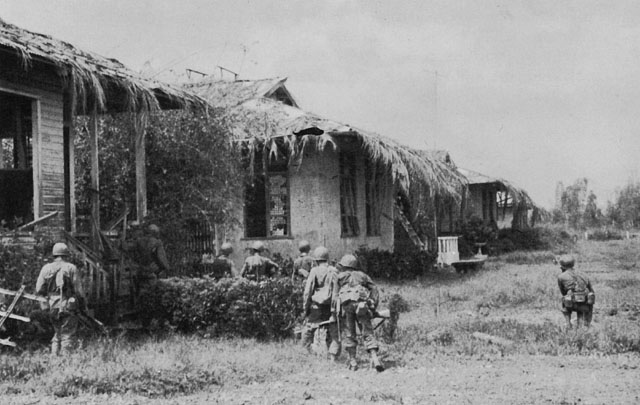 BURAUEN is searched for the enemy by troops of the 17th Infantry.