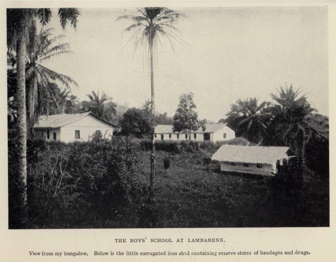 THE BOYS' SCHOOL AT LAMBARENE.  View from my bungalow.  Below is the little corrugated iron shed containing reserve stores of bandages and drugs.