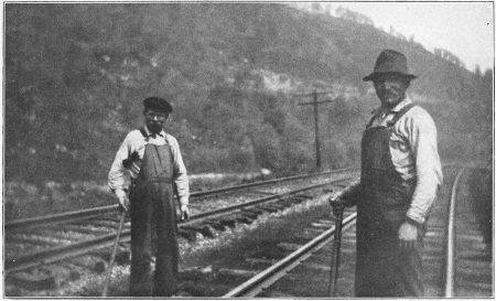 SLOVAKS WORKING ON THE LINE WITH PICK AND SHOVEL