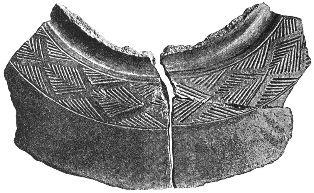 FRAGMENT OF BOWL OF GLAZED POTTERY