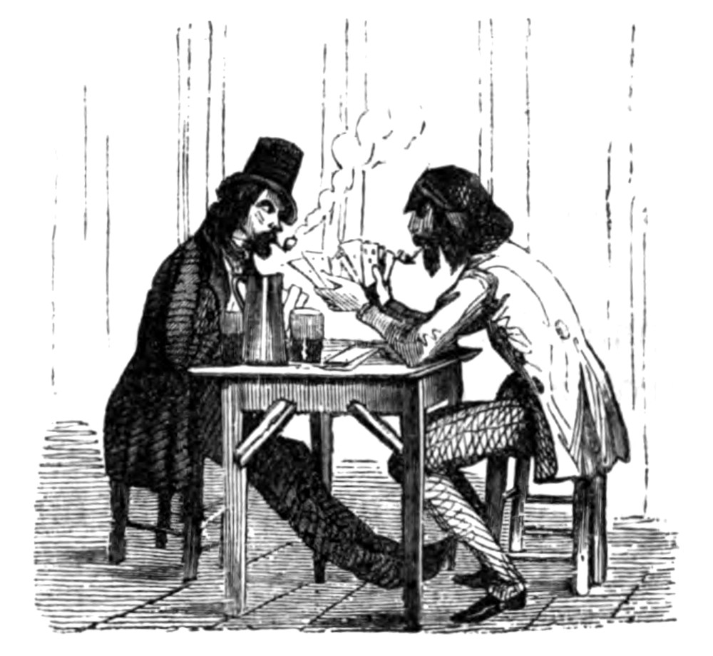 Dos hombres sentados en una mesa