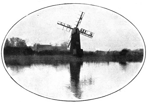 river scene with windmill