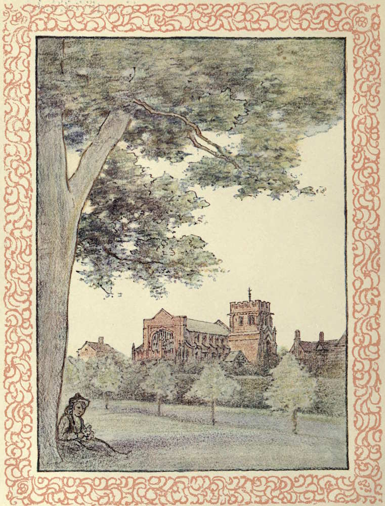 Person sitting under a tree with a church in the background
