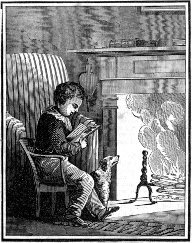 boy reading at fireplace