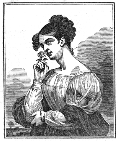 Woman smelling a rose