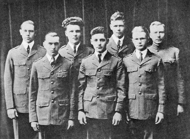 INSTRUCTOR AND CLASSMATES IN A MID-WESTERN MILITARY SCHOOL
