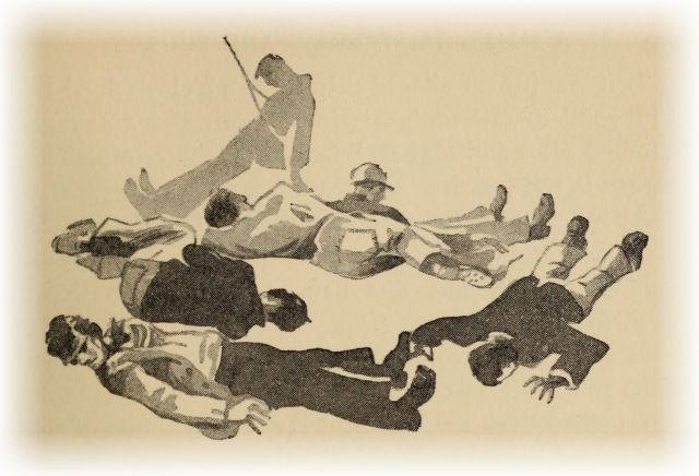 group of men laying on the ground