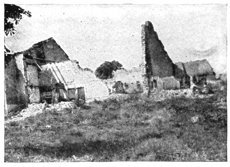 Buildings demonstrating damage.