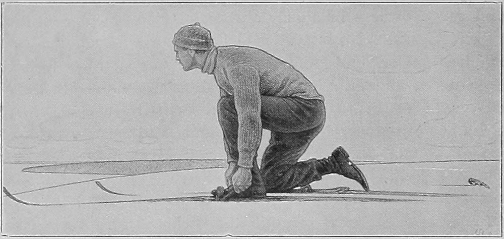 A MAN BINDING ON HIS SKIS