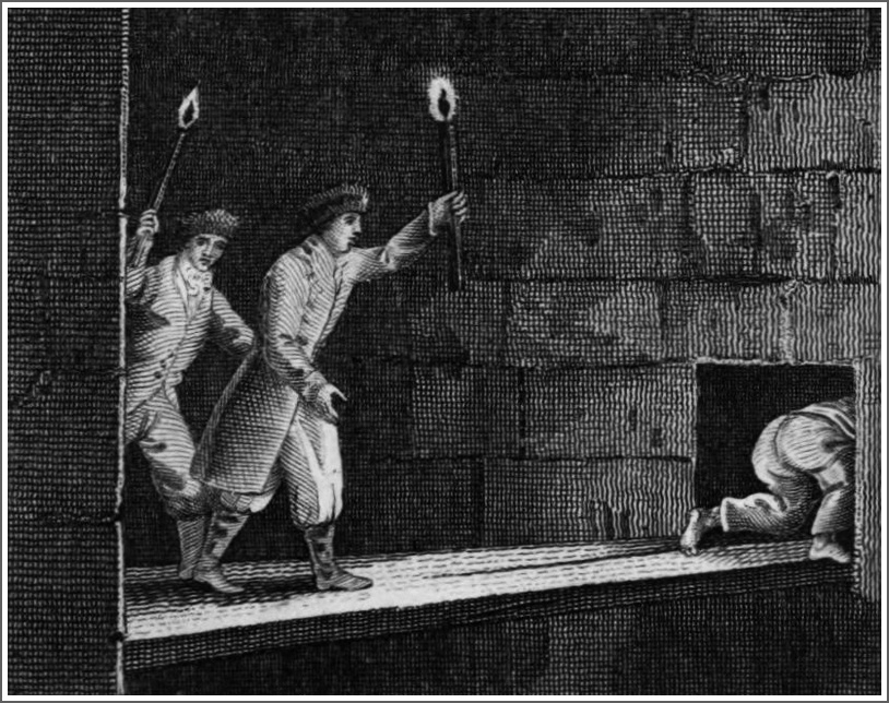 Workers with torches crossing the pit