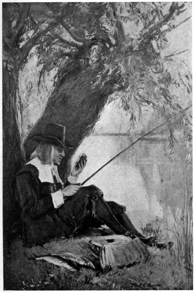 Walton seated under a tree on the bank of a river, fishing pole extended from his hand. Two fish lie on the ground next to him.