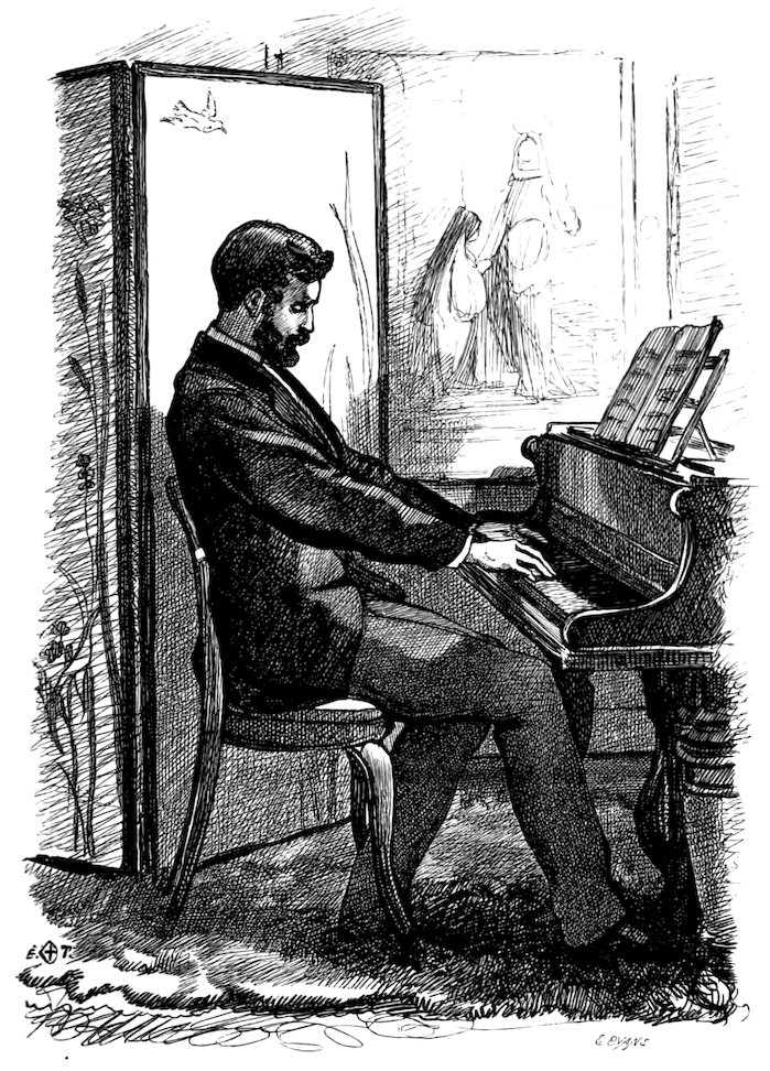 A bearded man playing the piano.
