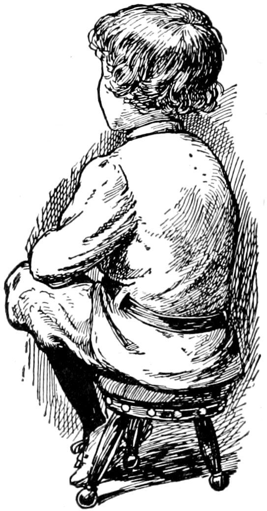 A child sitting on a small stool, viewed from behind.