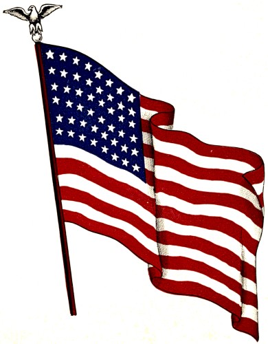 The U.S. flag unfurls in the evening breeze on Flag Day during the Atlanta  Braves and