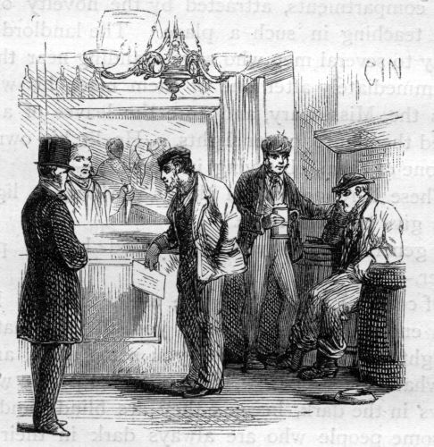 Man speaking to other men in bar