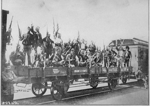 BELGIAN SOLDIERS LEAVING FOR THE FRONT. ALL KINDS OF
ROLLING STOCK WERE REQUISITIONED FOR THIS PURPOSE.

Photo by International News Service.