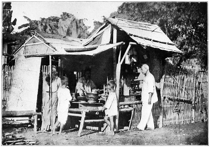 A “Chow” Shop on a Street Corner. Stewed Grasshoppers for a Penny.