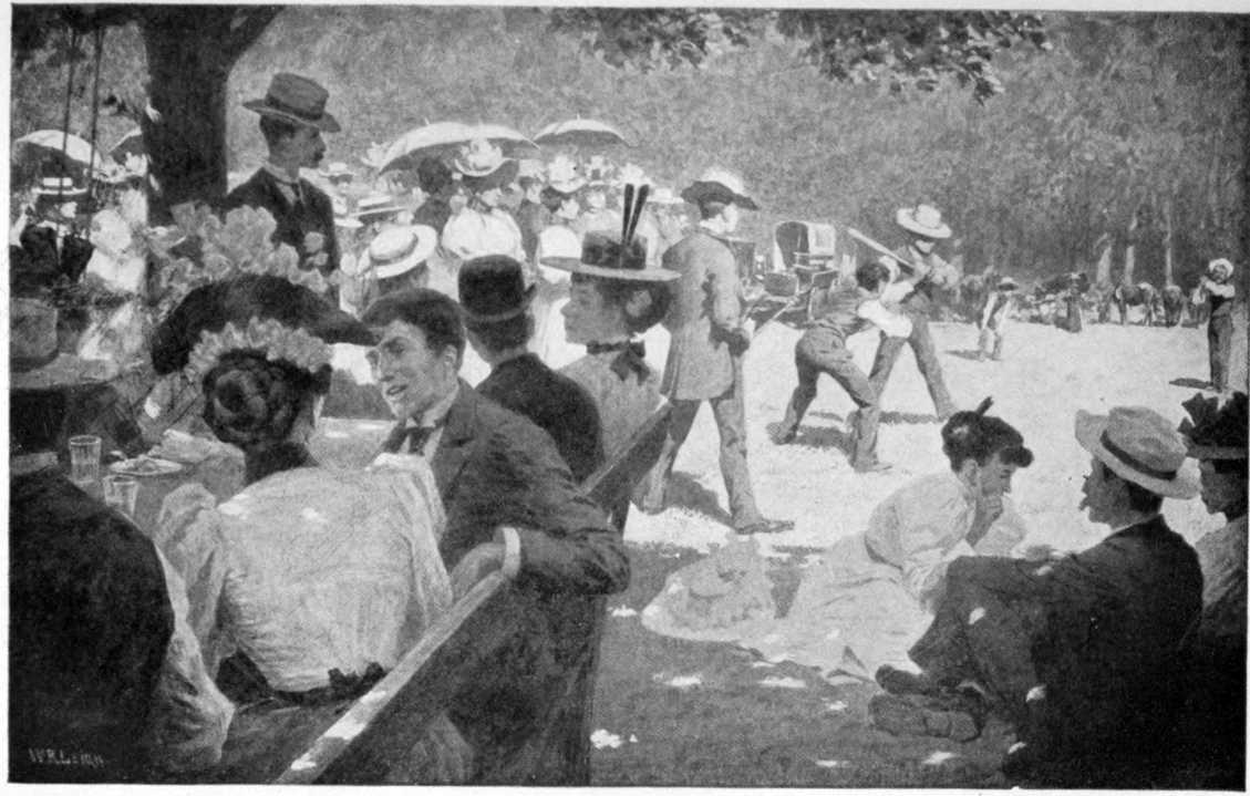 A sunny day at the fairgrounds with many men and women sitting and
standing. There is a baseball game in the background.