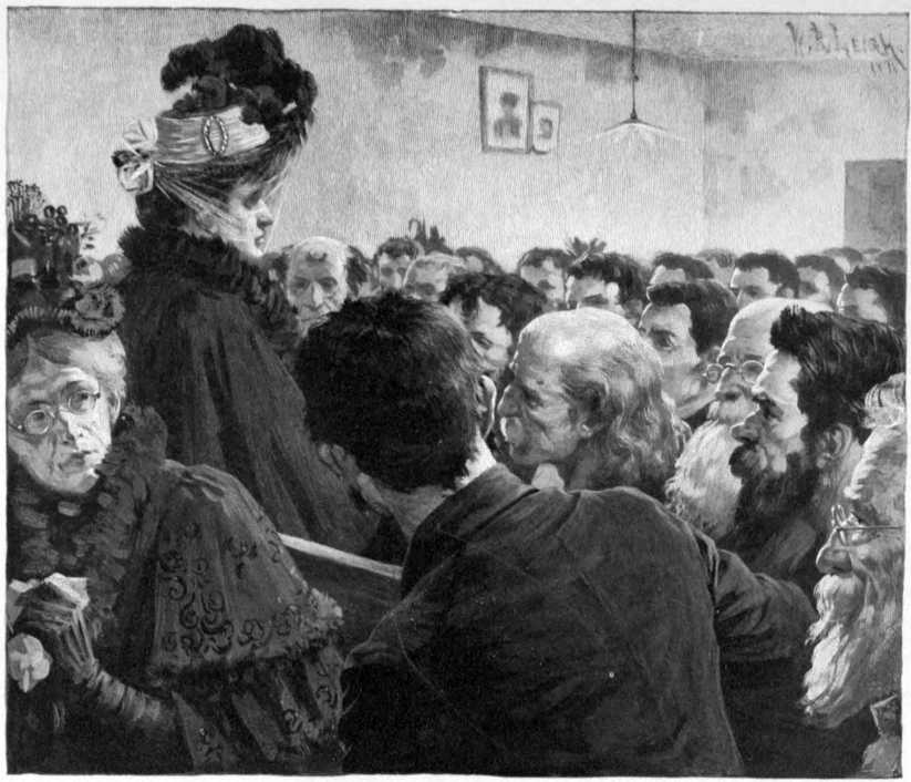 A room full of people sitting in pews.
One woman is walking back down the aisle.