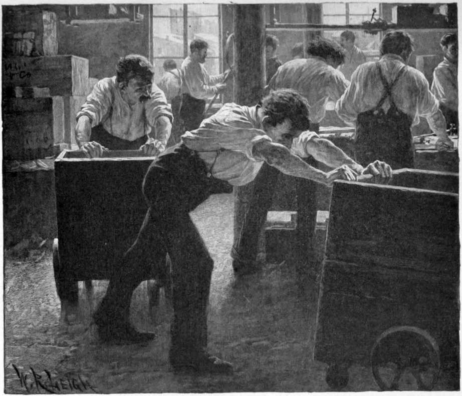 A room full of men. Some are working at a bench.
Some are pushing carts.